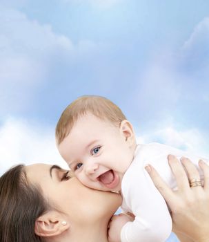 family, child and happiness concept - happy mother with baby