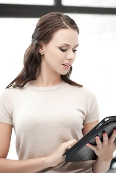 business and technology concept - woman with tablet pc computer or touchpad