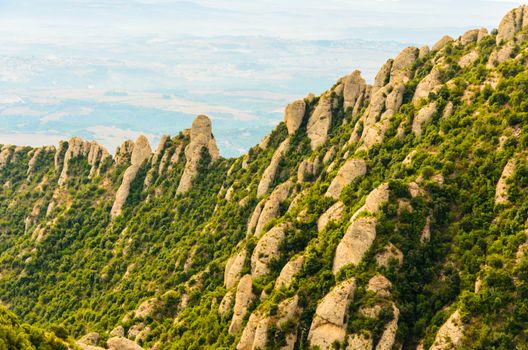 Montserrat is a mountain odd shape mountain at  Barcelona, Spain.