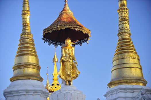 Buddha statue on top of pagoda around Shwedagon Pagoda - Yangon,Burma