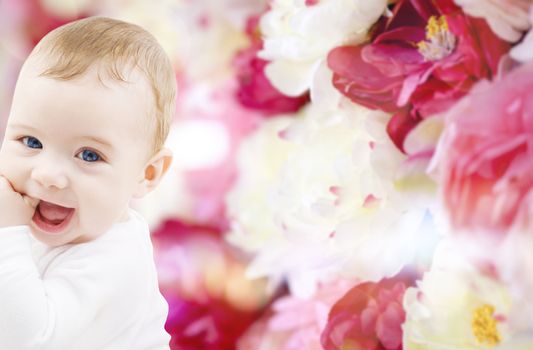 child, people and happiness concept - adorable baby boy