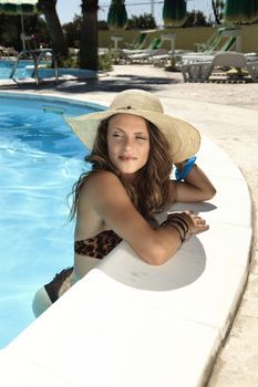charming girl with straw hat