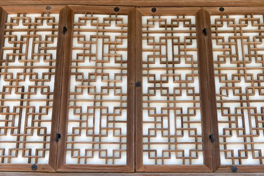 Background pattern of a traditional wooden paper door in Korea