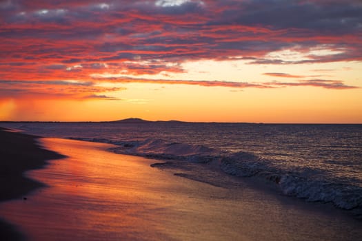 Sunset over the ocean very early in the morning