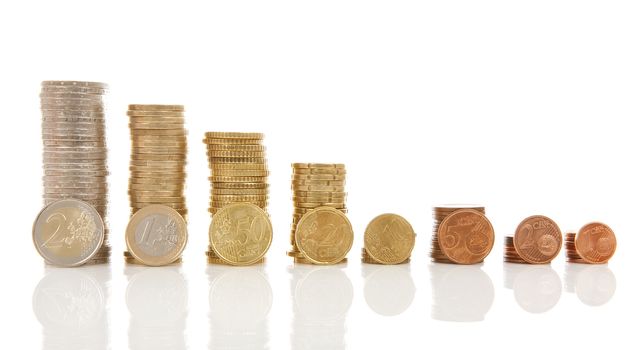 Piles of Euro money coins over white background