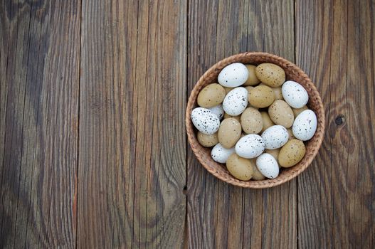 Easter eggs inside a wicker basket 