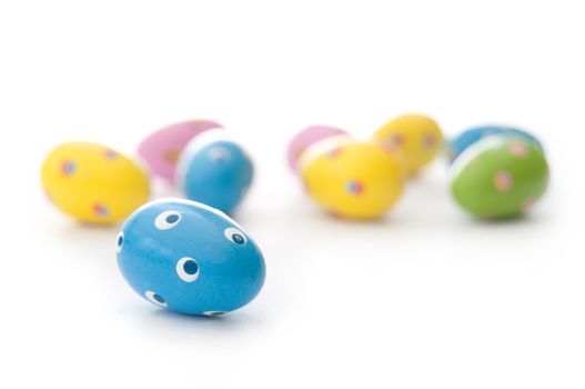 Closeup of painted easter eggs on a white background