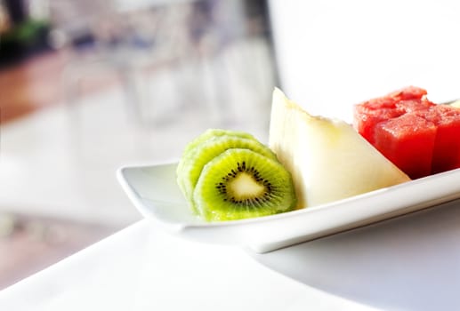 Healthy breakfast with a view. colorful and appetizing fruits.