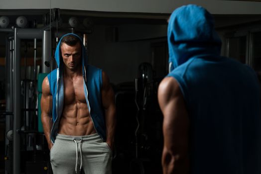 Portrait Of A Physically Fit Young Man In A Healthy Club