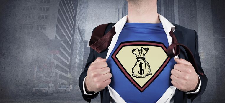 Businessman opening shirt in superhero style against urban projection on wall