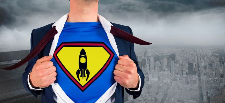 Composite image of businessman opening shirt in superhero style against gloomy city