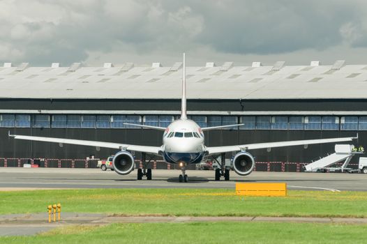 Farnborough, UK - July 15, 2012: British Airways Airbus A318 taxiing before take-off at the Farnborough Airshow, UK