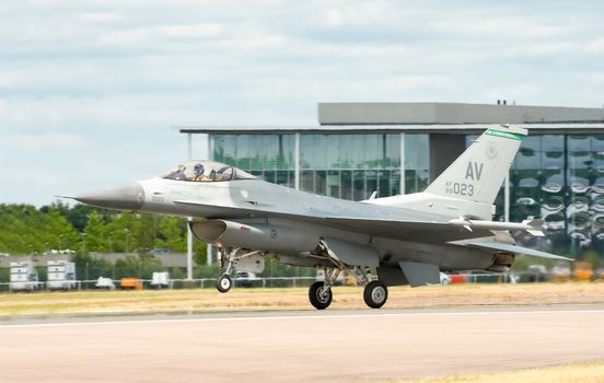 Farnborough, UK - July 24, 2010: USAF F-16 landing at the Farnborough Airshow, UK