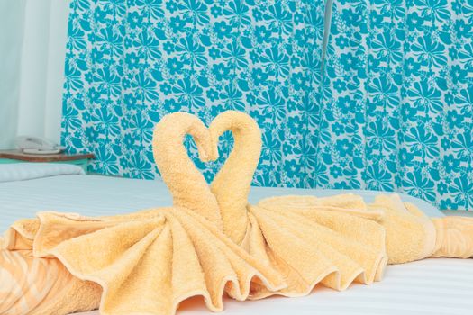 Towel folded in swan shape