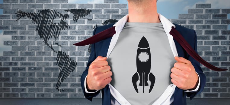 Businessman opening shirt in superhero style against world map doodle against wall