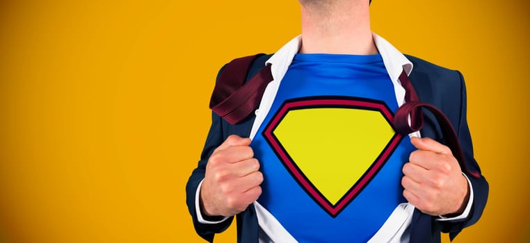 Businessman opening shirt in superhero style against yellow background with vignette