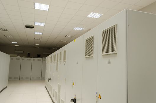 Powerful server computer in special cabinets stored in scientific research center.