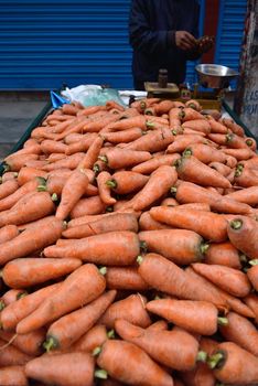 carrot in market scene near Boudha Nath (Bodhnath) stupa, kathmandu, nepal