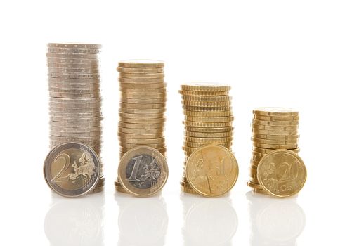 Piles of Euro money coins over white background