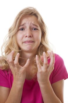 Portrait of sad girl in despair over white background