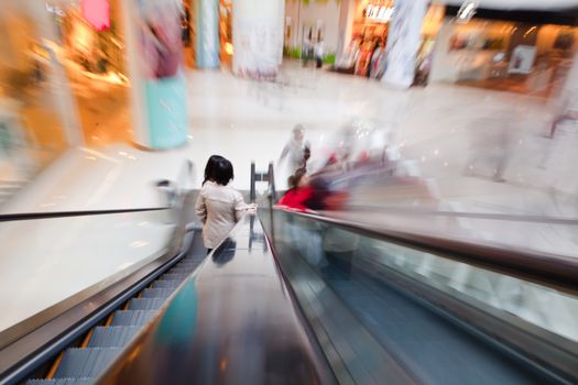 people on the moving escalator