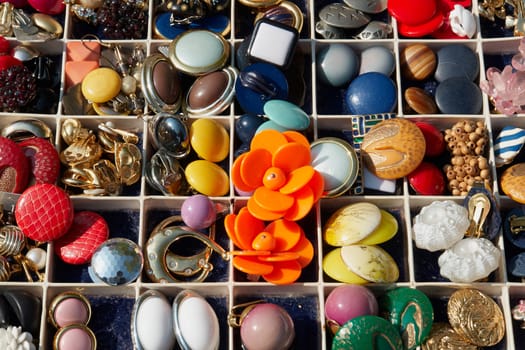 An assortment of colorful old vintage buttons for sale                               