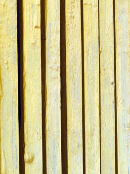 A background of a window grills made of wooden planks in an old Indian village house.                               