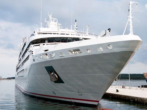 modern cruise ship anchored in port