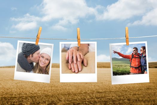 Composite image of instant photos hanging on a line against field and blue sky