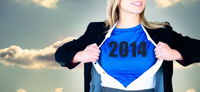 Businesswoman opening her shirt superhero style against bright blue sky with cloud