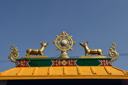 Golden brahma symbol on reef top of buddhis temple around Boudha Nath (Bodhnath) stupa in kathmandu, Nepal