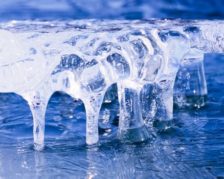 Nature ice sculpture formed by repeated thaw freeze cycles and wave action on lake shore