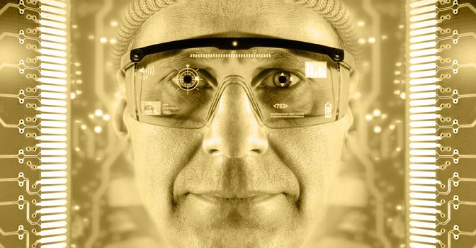 Portrait of men in smart glasses on a electronic circuit board background. Toned gold.