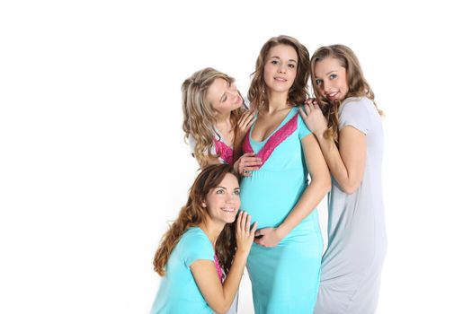 Young mum in colorful pajamas and four friends