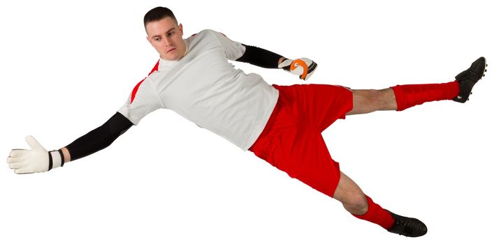 Fit goal keeper jumping up on white background