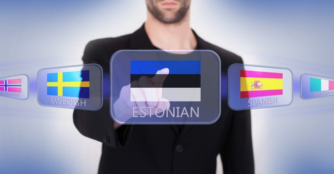 Hand pushing on a touch screen interface, choosing language or country, Estonia