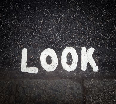 Look sign painted on the street