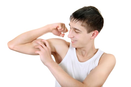 Handsome Teenager Muscle flexing Isolated on the White Background