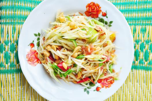 Green papaya salad Thai cuisine spicy delicious : " SOM TAM " Thai speak