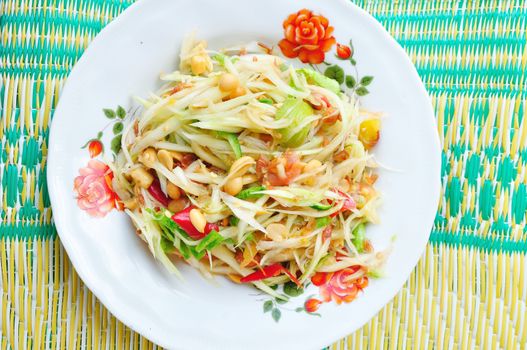 Green papaya salad Thai cuisine spicy delicious : " SOM TAM " Thai speak