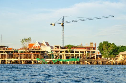 Construction site beside the River of Chaopraya in Bangkok, Thailand