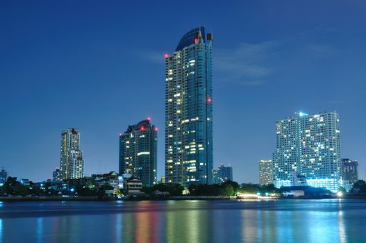 Landscape of Bangkok City with Chao Praya River in dusk 