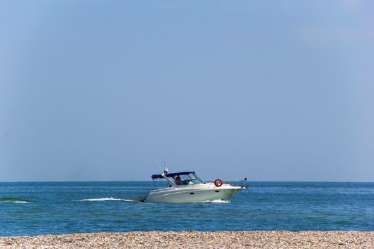 small small white boat in the sea