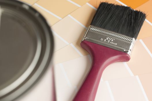 Choosing your color with sample color chart ; focus on paint brush 