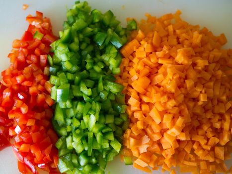 Close up of freshly cut raw vegetables ingredients for a salad