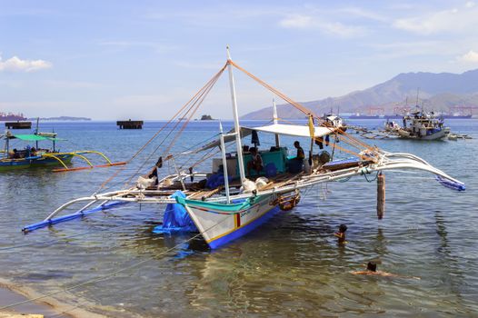 Philippines Fishing Boat and Children. Philippines, Olongapo City 06 06 2013  EDITORIAL