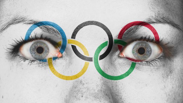 Women eye, close-up, blue eyes, olympic rings