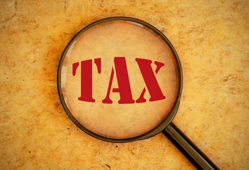 Magnifying glass focused on tax heading 