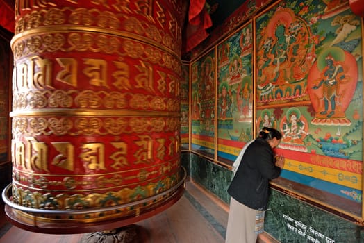 Huge rotating praying drum in Boudhanath stupa, Kathmandu, nepal