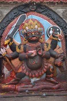 Statue of hindu deity Shiva in the form of fearful Bhairab on Durbar Square in Kathmandu, Nepal